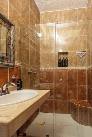 Shower, hair dryer, towels, soap
