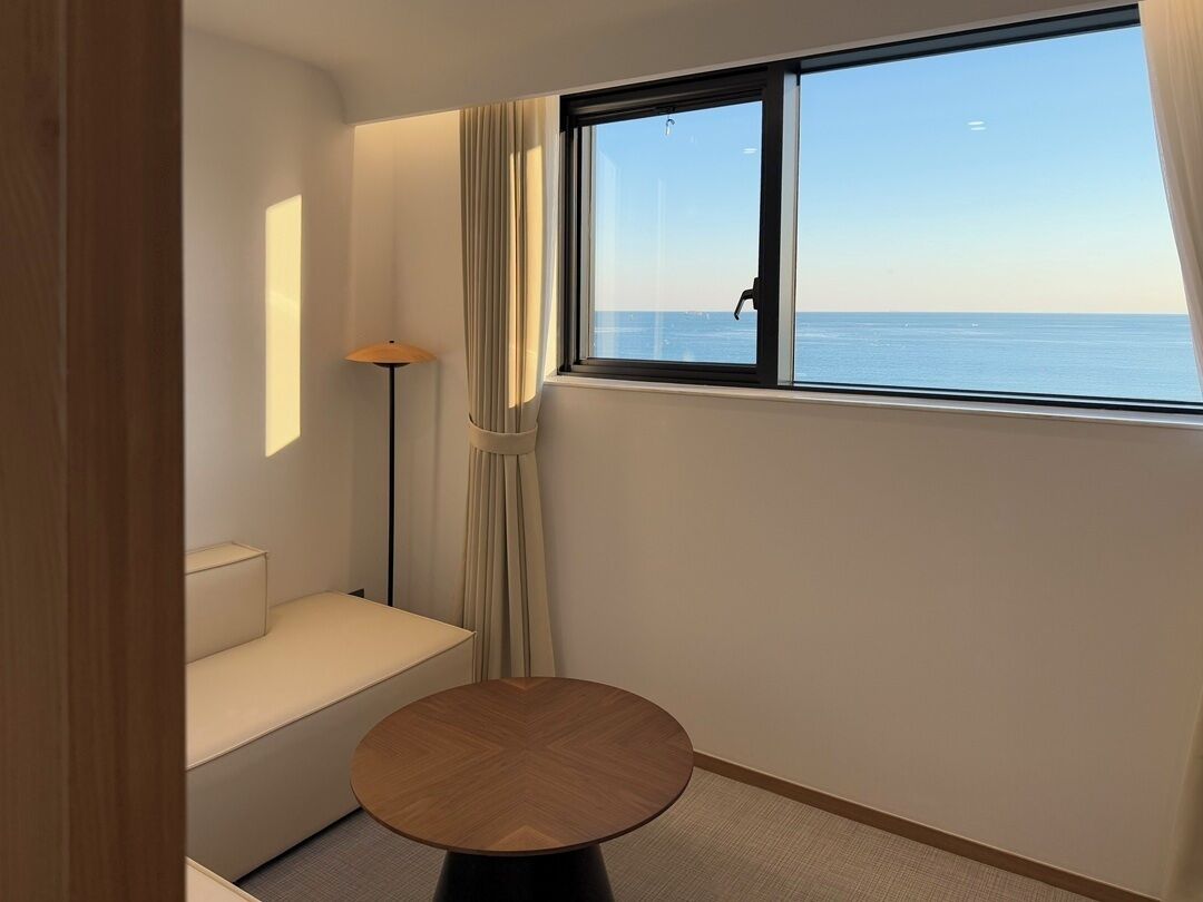 Deluxe Studio, Sea View | Living area | 65-inch Smart TV with cable channels, Netflix, streaming services