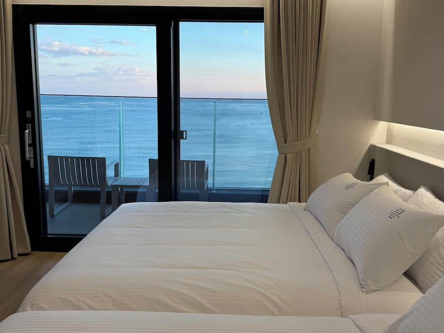Signature Room, Balcony, Sea View | Blackout drapes, free WiFi