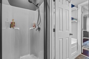 Shower, hair dryer, towels, soap
