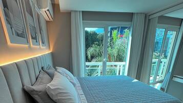 2 quartos, ferros/tábuas de passar roupa, berço de viagem