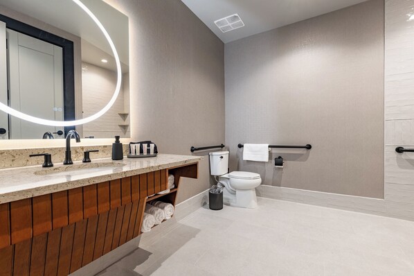 Bathroom 3 - Spacious ADA-compliant bathroom featuring a large shower.