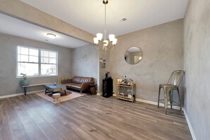 Smart TV, fireplace, foosball, books