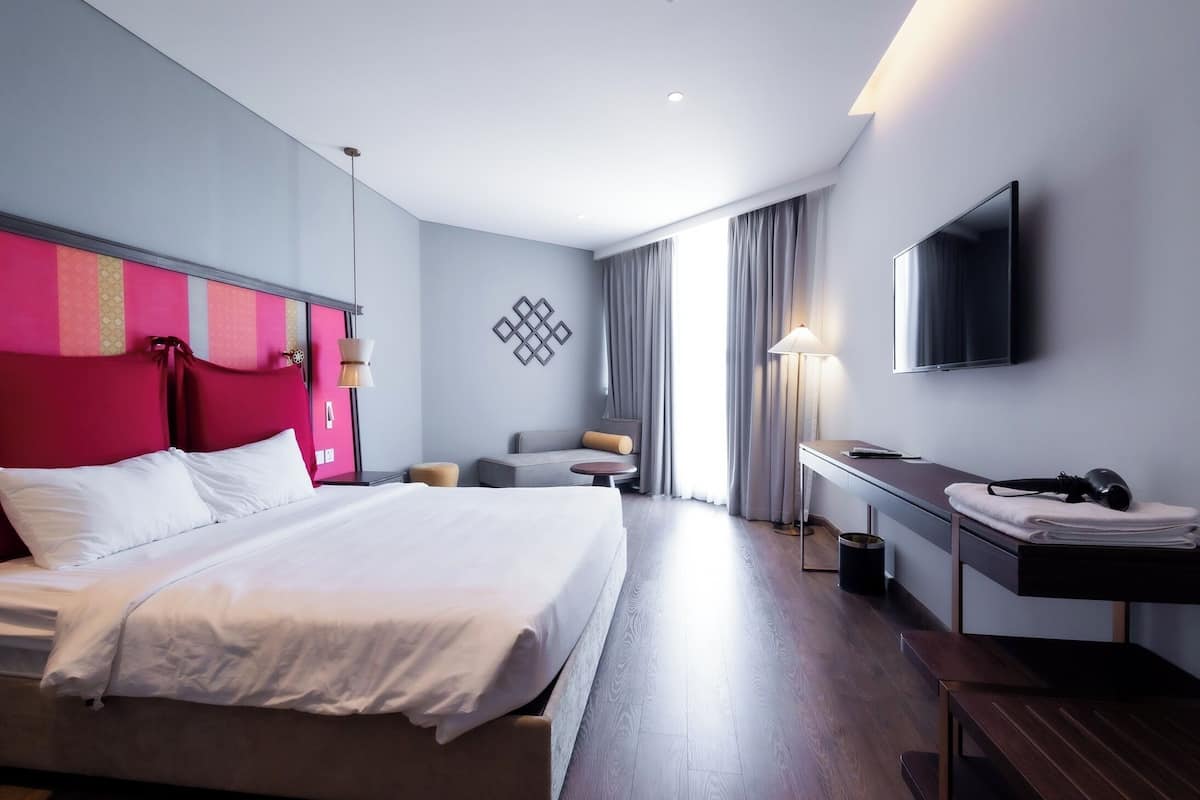 Chambre Premium, 1 trĂšs grand lit, vue partielle sur l'ocĂ©an, vue mer | Vue sur la plage/lâocĂ©an