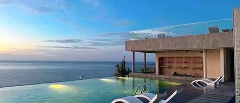 2 outdoor pools, open 6:00 AM to 8:00 AM, free cabanas, pool umbrellas