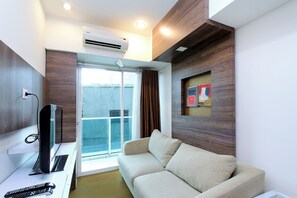 Departamento familiar, vista a la ciudad | Área de sala de estar