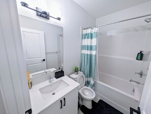 Hair dryer, towels, soap, shampoo