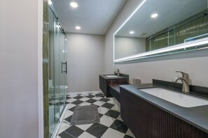Jetted tub, hair dryer, towels, soap