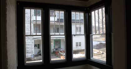 All one floor Charming large 2 bedroom, LR, sunroom, kitchen 2 baths wt laundry.