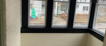 All one floor Charming large 2 bedroom, LR, sunroom, kitchen 2 baths wt laundry.