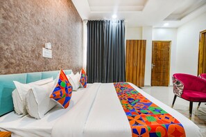 Premium Room | Egyptian cotton sheets, premium bedding, pillowtop beds, in-room safe - Fabhotel Radiant Blu (Noida)