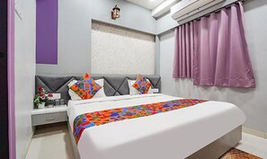 Egyptian cotton sheets, premium bedding, pillowtop beds, in-room safe - Fabhotel Imperial Suites (Nagpur)