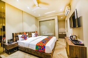 Deluxe kamer | Lakens van Egyptisch katoen, luxe beddengoed, een kluis op de kamer