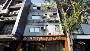 A hotel entrance with a sign reading "HOTEL 7 STAR". - Fabhotel 7 Star I (Surat)