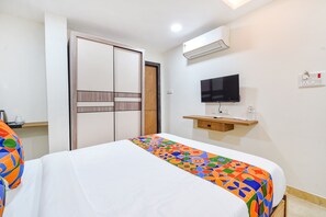ห้องดีลักซ์ | ผ้าปูที่นอนฝ้ายอียิปต์, เครื่องนอนระดับพรีเมียม, ตู้นิรภัยในห้องพัก