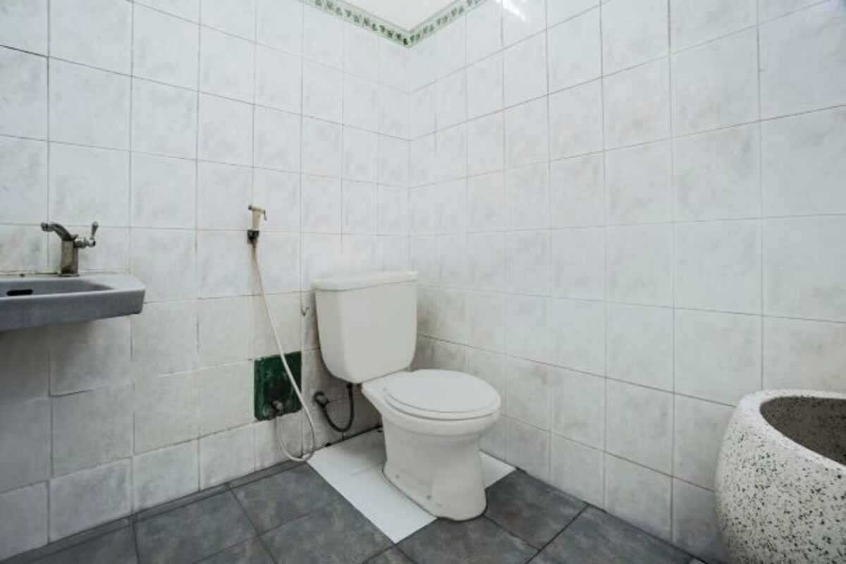 Banheiro | Chuveiro, toalhas de banho, sabonete, shampoo