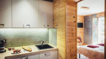 Superior Double Room, Mountain View | Private kitchen | Full-sized fridge, microwave, stovetop, high chair