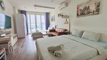 Basic Condo, City View | 1 bedroom, desk, laptop workspace, blackout curtains