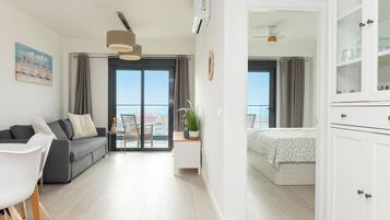 1 dormitorio, tabla de planchar con plancha, Internet y ropa de cama