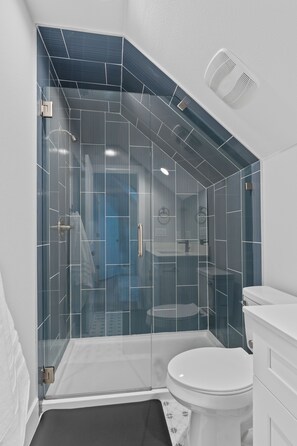 Hair dryer, towels, soap, shampoo