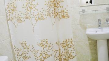 Single Room, Courtyard View | Bathroom | Shower, free toiletries, hair dryer, towels