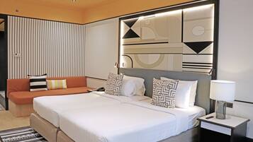 Superior Twin Room | Minibar, in-room safe, laptop workspace, blackout curtains