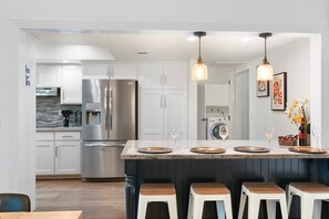 Coffee/tea maker, fridge, microwave, oven