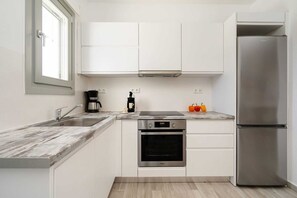 Réfrigérateur, four, plaque de cuisson, lave-vaisselle