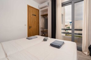 2 عدّة غرف نوم ومكواة/لوح كي وسرير سفر وواي فاي مجانًا