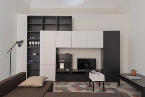 Family Apartment | Living area | 35-inch TV with digital channels - Darsena Apartments by Wonderful Italy (Syracuse)