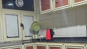 A kitchen with cabinets, a sink, and a fan. - Furnished Studio Appartment in Burdubai  (Dubai)