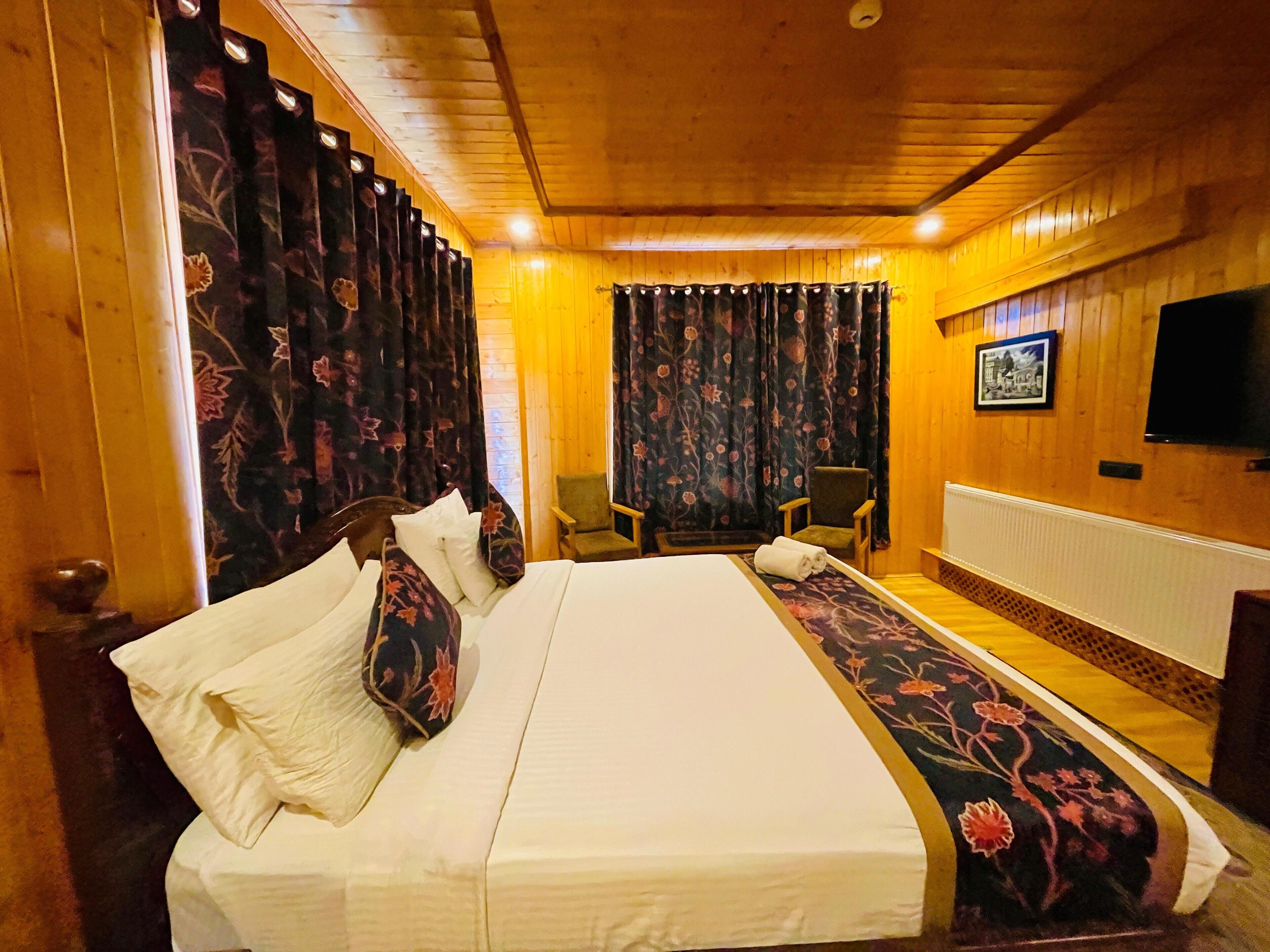 Minibar, desk, laptop workspace, iron/ironing board