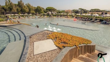 Seasonal outdoor pool, open 10:00 AM to 6:00 PM, pool umbrellas