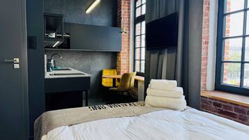 Estudio económico | 1 dormitorio y espacio para trabajar con un portátil