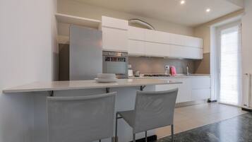 Apartment, Balcony | Private kitchen | Electric kettle