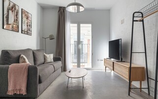 One-Bedroom Apartment with Terrace | Living area | 43-inch Smart TV with satellite channels