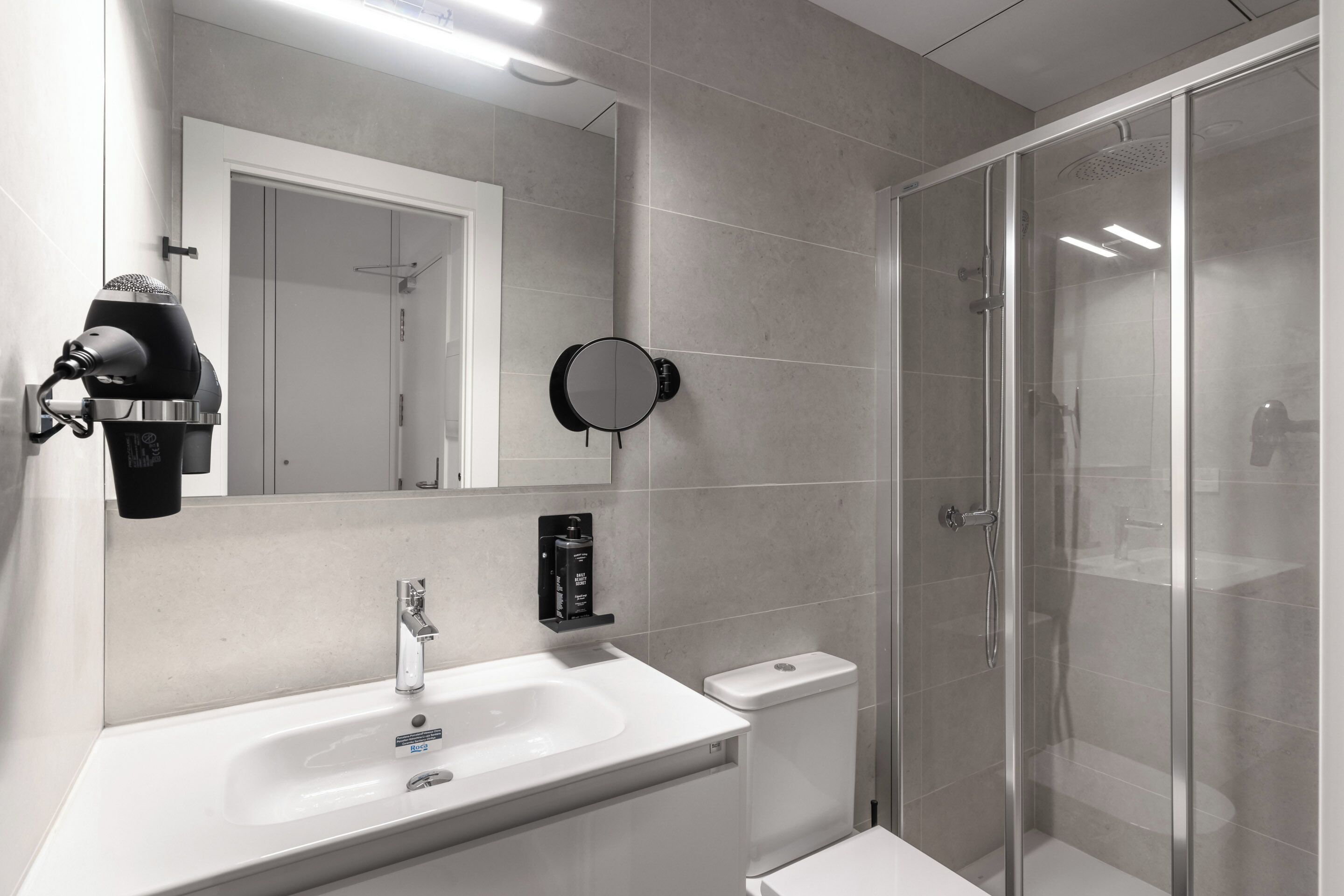 Shower, eco-friendly toiletries, hair dryer, towels