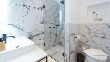 Premium Apartment, 1 Bedroom, Patio, Garden Area | Bathroom | Shower, free toiletries, hair dryer, towels