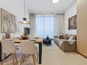 Premium Apartment, 1 Bedroom, Patio, Garden Area | Living area | 50-inch LED TV with satellite channels - Living No. 5 by GT7 Hospitality (Vienna)