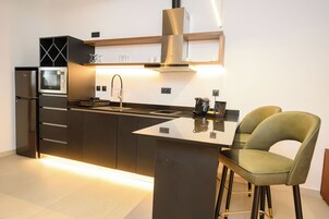 Fridge, microwave, stovetop, cookware/dishes/utensils