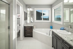Shower, hair dryer, towels, soap - Large new family home near Airport and mall!  I AC I Garage I Sleep 16+ (Calgary)