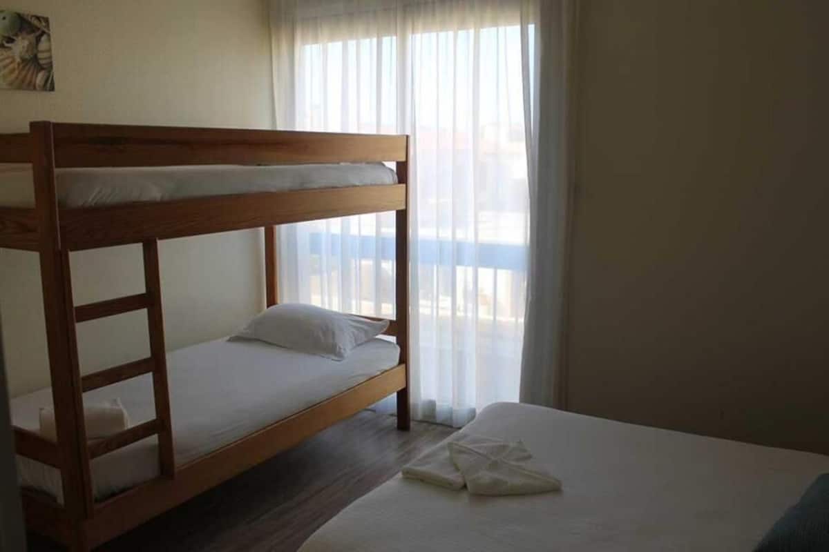 Quadruple Room, Multiple Beds, Partial Sea View | Desk, soundproofing, free WiFi