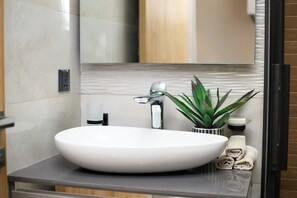 Shower, towels, soap, shampoo