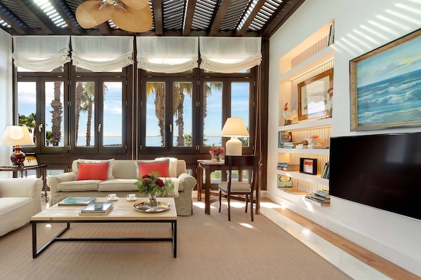 Apartment (2 Bedrooms) | Living room | 52-inch Smart TV with satellite channels