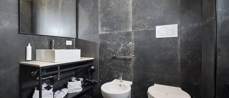 Deluxe Double Room | Bathroom | Shower, hair dryer, bathrobes, slippers