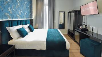 Deluxe Double or Twin Room | Free minibar, in-room safe, desk, laptop workspace