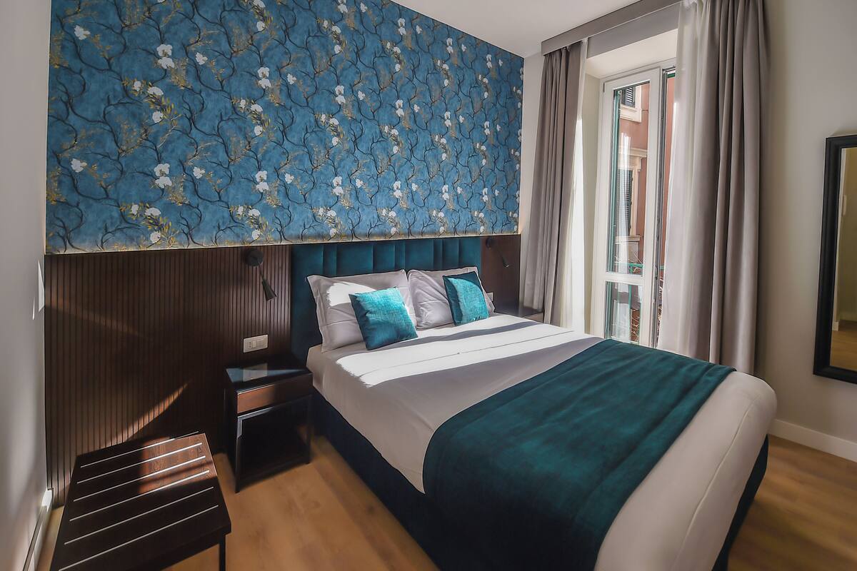 Deluxe Double or Twin Room | Minibar (free items), in-room safe, desk, laptop workspace