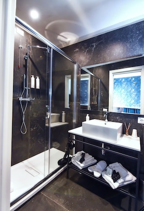 Deluxe Double Room | Bathroom | Shower, hair dryer, bathrobes, slippers