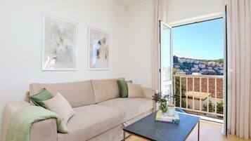 Apartment (1 Bedroom) | Living room | 108-cm Smart TV with cable channels