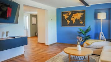 Exclusive Condo, 2 Bedrooms, Sauna | Living area | 100-cm Smart TV with digital channels